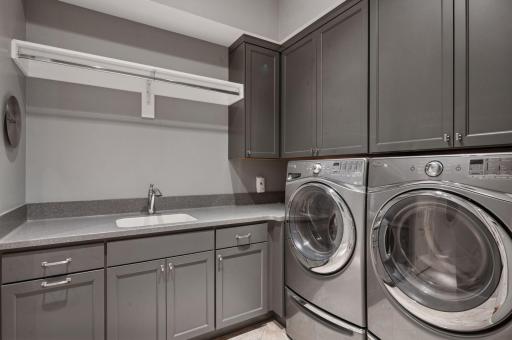 Pristine Laundry Room off of the Living Room.