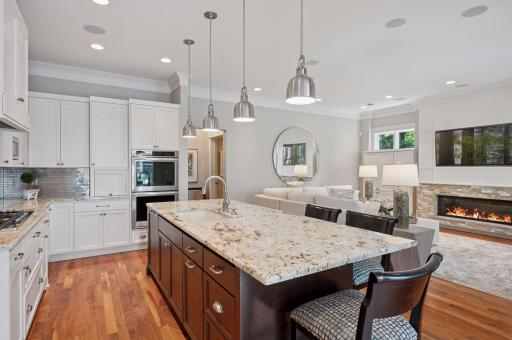 Kitchen flows seamlessly into the living area.