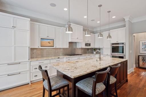 Beautiful granite center island and double wall ovens.