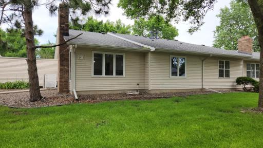 View of the front of property. Lawn is beautiful! Home is close to Maple Grove Hospital.