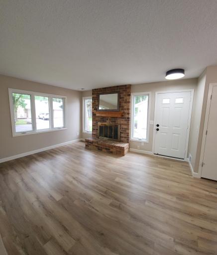 Gas fireplace for the cold Minnesota winters! Tons of natural light shining through!