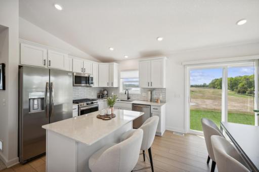 (Photo of the model home, actual finishes may vary) Welcome to the Emily!