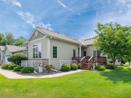 Beautiful executive style townhome living! Creatively designed with impressive curb appeal, landscape & entry! The large maintenance free deck is perfect for greeting guests, grilling, or just relaxing & enjoying the peaceful outdoors.