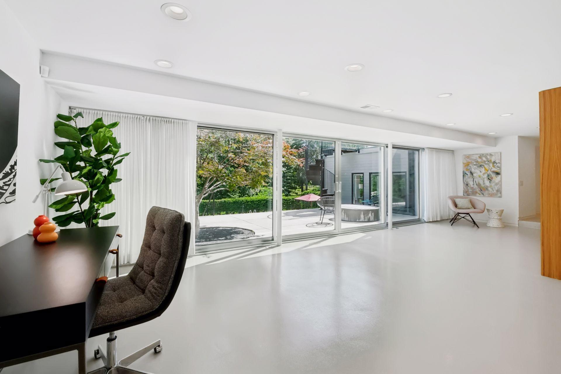 Lower level game room / office / 3rd family room with room for a pool table, ping pong, or air hockey