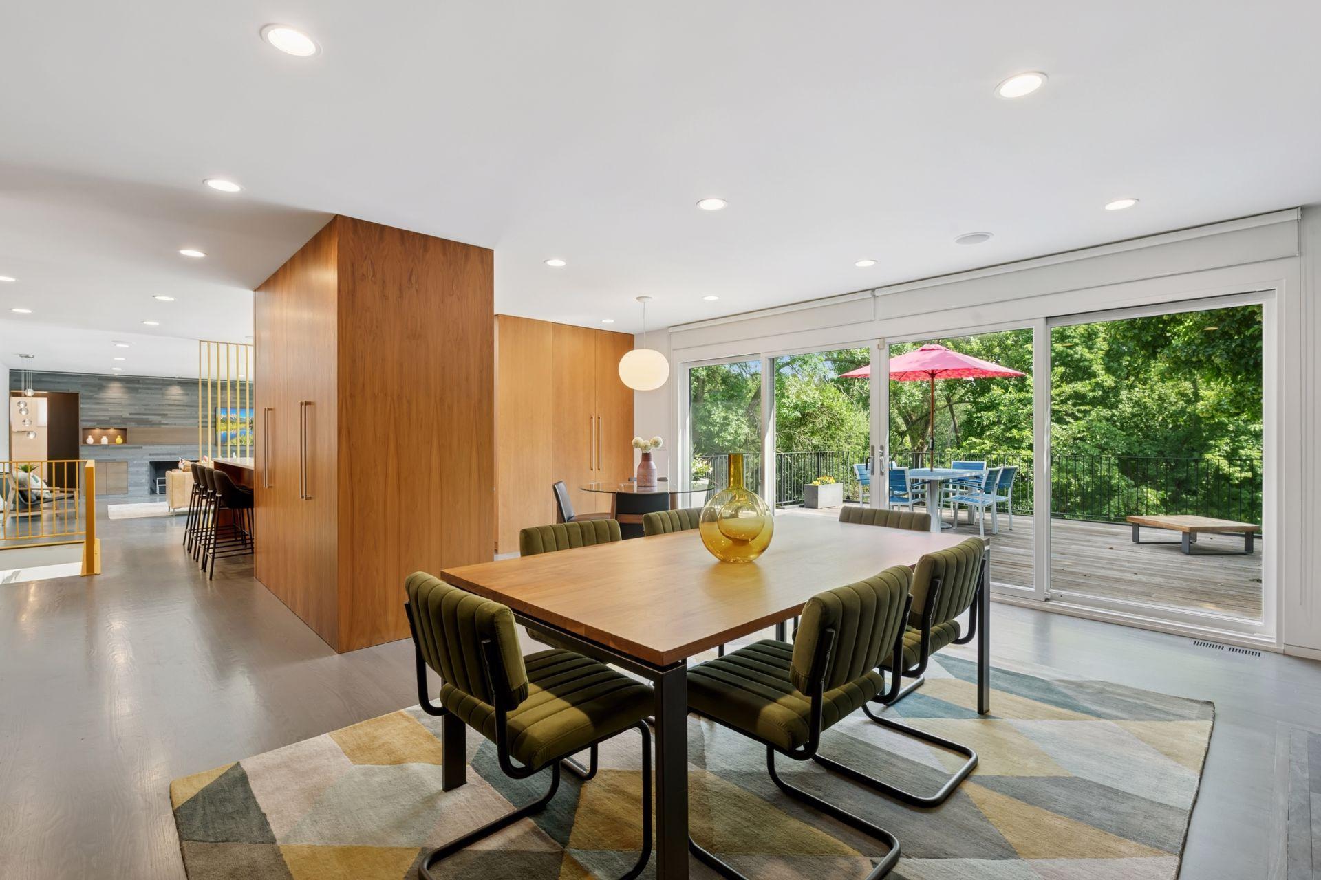 Dining / Family Room that leads to an enormous deck via massive sliding glass doors