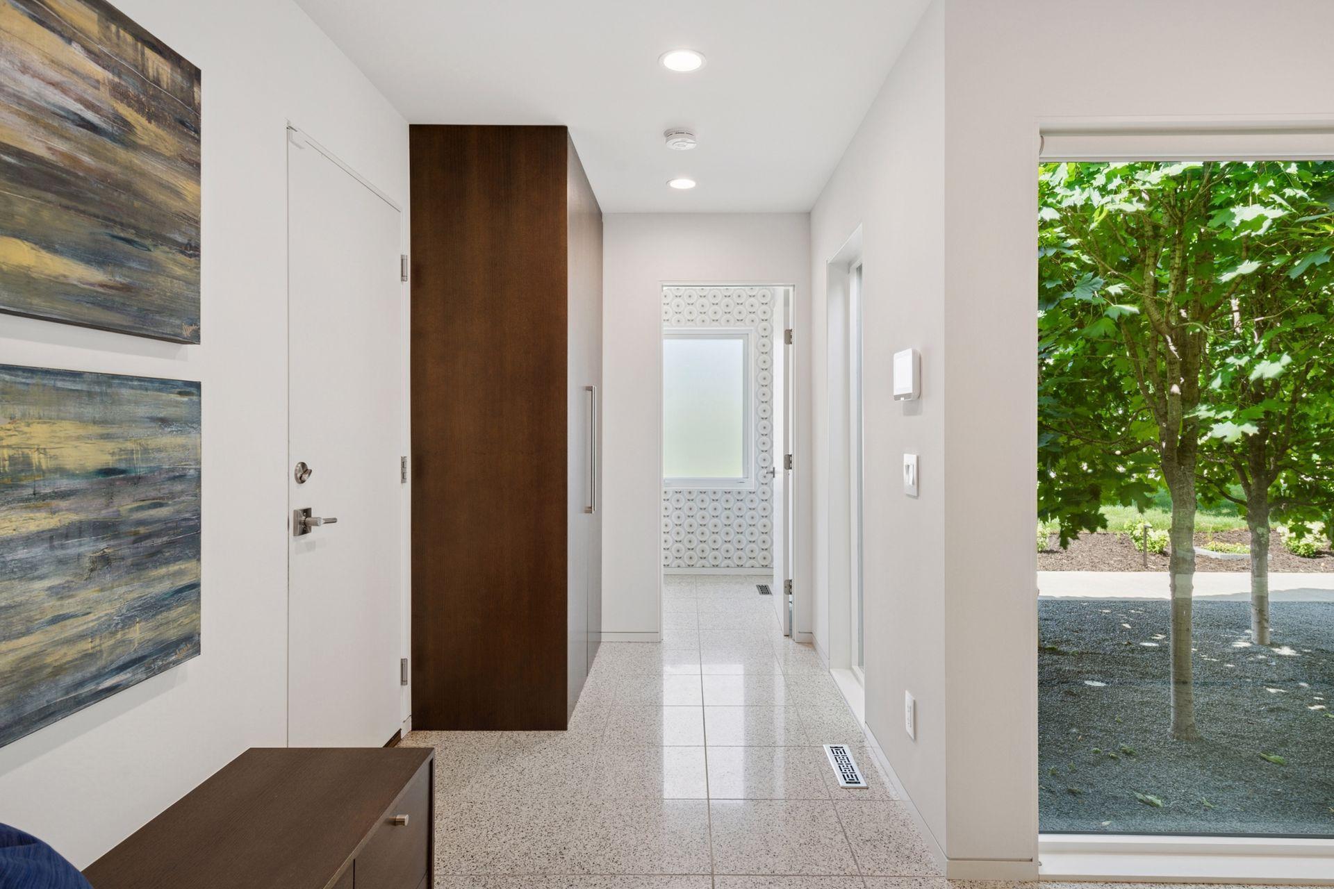 Main level mudroom with heated floors