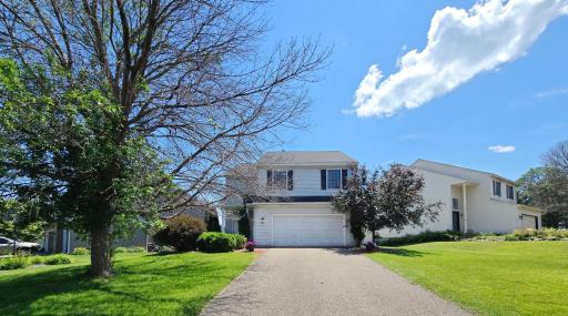 2- Sunlit Front of Home with Two-Car Garage.jpg