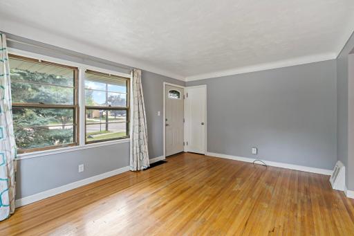 Notice the convenient coat closet near the front door.