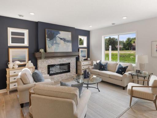 Main Level Great Room - Pictures are of a model home with a similar floorplan (colors & options will vary)