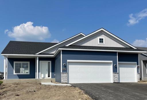 9752 32nd St NE - Home will be ready for move-in 8/25/25! One level featuring spacious concrete front porch located on a walkout homesite. Sod, Irrigation System, and Front Plantings included.