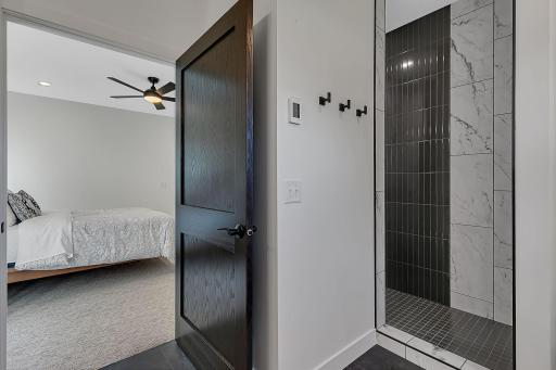 A custom walk in shower thoughtfully designed with privacy in mind