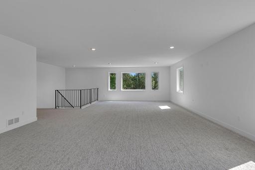Wooded views and high ceilings, with tons of space for lounging & recreation