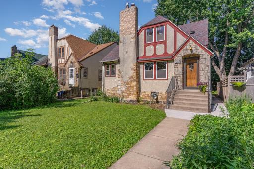 Lovely South Minneapolis Tudor home with stucco and brick accents.