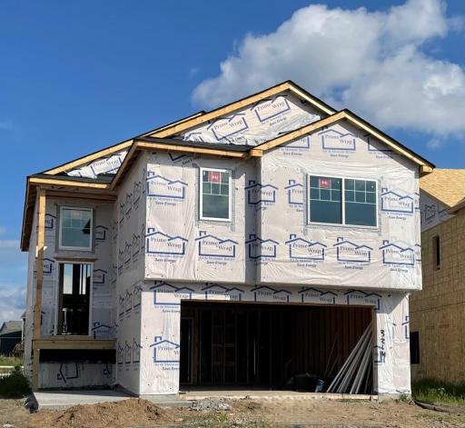 3214 Kady Ave NE- Photo of home progress. Estimated completion October. Front steps, siding, and stone accents will be installed soon.