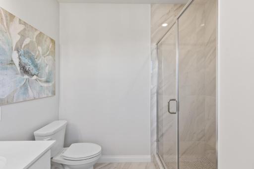 Floor to ceiling tiled shower
