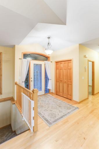 Welcoming front entry with abundant natural light, spacious layout, and a warm, inviting atmosphere.