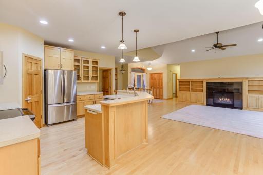 Kitchen features solid oak cabinets and sleek stainless steel appliances for a timeless, functional design.