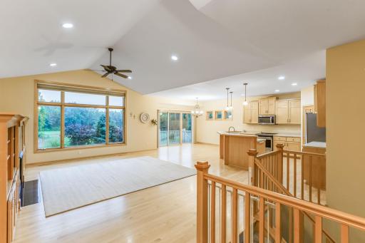 Stunning view from the front door showcasing a large picture window with beautiful sights of the golf course beyond.