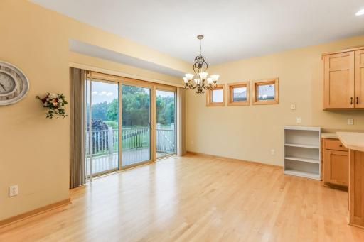 Spacious dining area perfect for gatherings, with easy access to the deck for seamless indoor-outdoor entertaining.