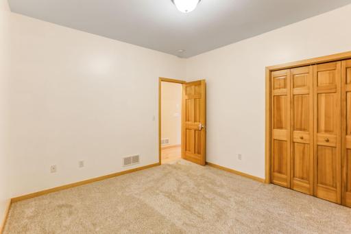 Solid oak six-panel doors are featured throughout the home, adding timeless charm and quality craftsmanship.