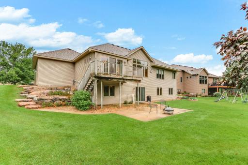 Beautiful backyard with scenic golf course views, mature landscaping, and plenty of space to relax or entertain.