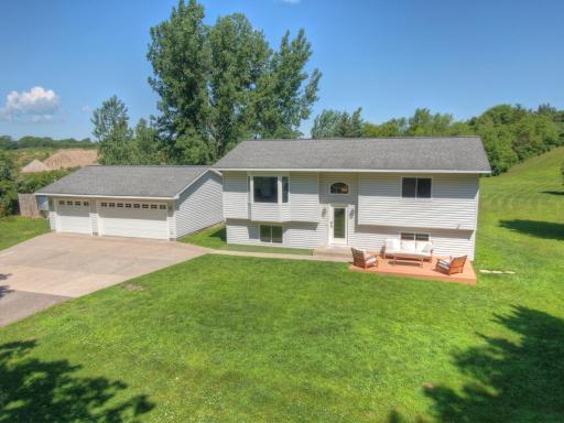 Spacious split-entry home on 1.09 acres in Buffalo with private well/septic. Features a large three stall garage and plenty of green space. Just minutes from schools, shopping, dining and entertainment!