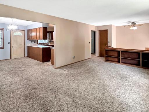 Open floor plan from living room to dining room, to kitchen