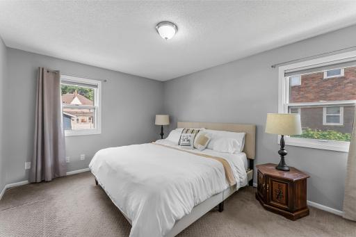 Primary bedroom with corner windows...