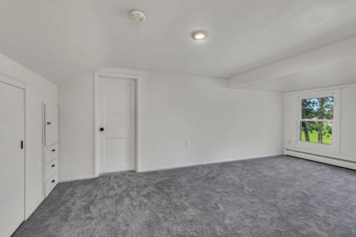 Upper-level flex space or potential 5th bedroom offers versatility. Provides direct access to the adjacent bedroom, making it perfect for a private retreat or creative use.
