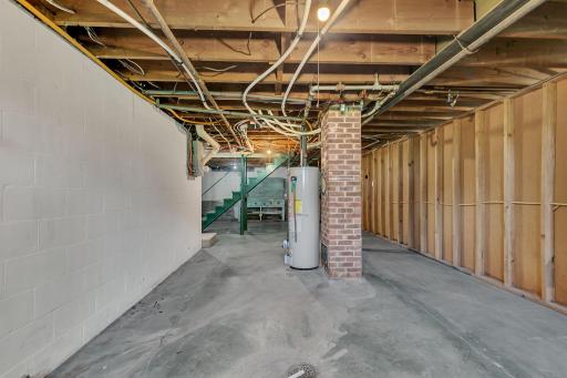 Another view of the utility area. This area would also be where the washer/dry would be placed. The basement also offers fruit cellar for those who love to garden & can.