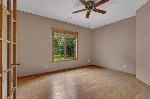 Large versatile den off of the living room.
