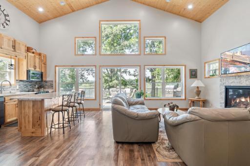 Oversized windows allow abundant natural light to flood the main level creating an open and bright living space.