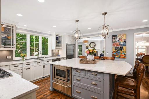 Kitchen is open to the family room with high end SS appliances plus a warming drawer