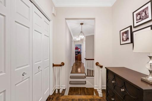 2nd floor landing with a full sized washer & dryer laundry closet