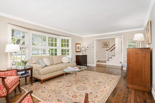 Wood floors, crown molding and planation shutters