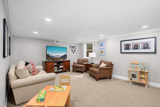 Nicely finished lower level 2nd family rm/ play room with window