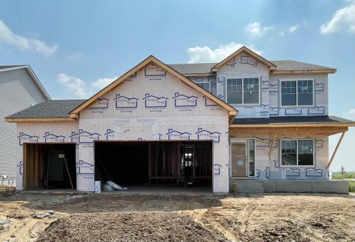 3235 Jandura Ave NE- Home offers an estimated Oct. move-in. Highlights include Spacious 4 Bay Garage (1,010 sq.ft.) & Concrete Front Porch located on a Walkout Corner Homesite on No Outlot Street! Porch columns & stone accents to be installed soon.