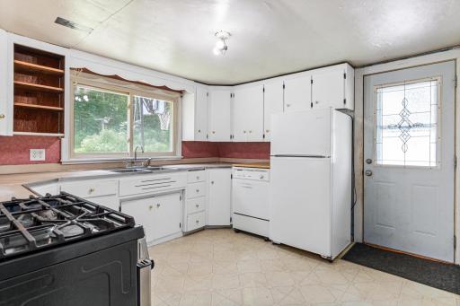 Kitchen overlooking backyard