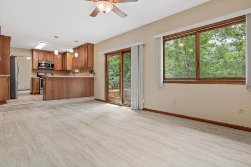 Sliding door opens to maintenance free deck