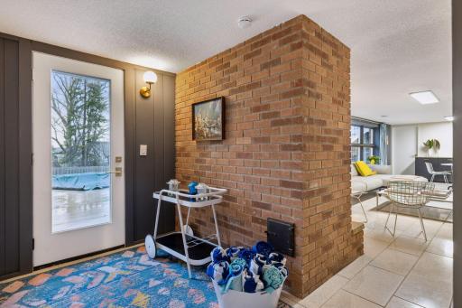 Lower level with easy access to the pool and a bathroom just to the left