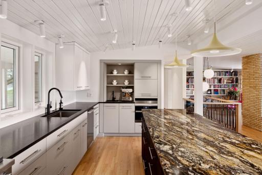 Granite counter tops, coffee bar next to the warming drawer and speed oven with convection