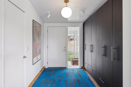 Entry with access to the garage and great storage