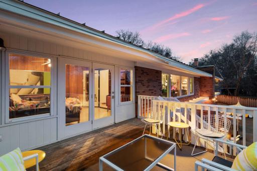 Main level deck providing easy access to the backyard and pool