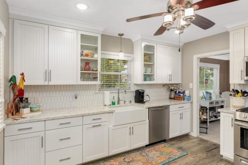 Unit 1 Kitchen - Granite countertops, tile backsplash and farmers sink!!