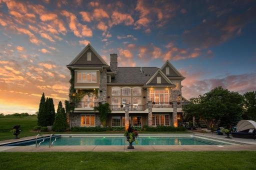 Private backyard oasis with a stunning pool as its centerpiece.