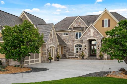 Grandeur and elegance await at this beautiful home.