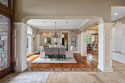 The dining room offers a seamless transition from other living spaces in this well-designed home.
