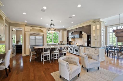 The spacious and open kitchen flows seamlessly into a comfortable sitting area.