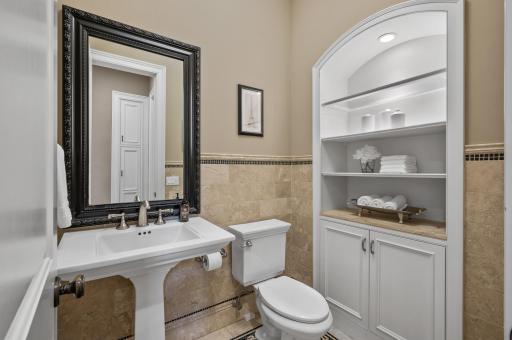A beautifully appointed half bath on the main level.