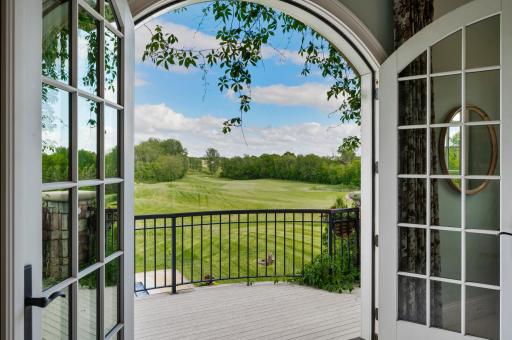 Step out onto the balcony and immerse yourself in the serene setting, directly accessible from the primary suite.